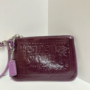 Coach Poppy Purple Embossed Clutch